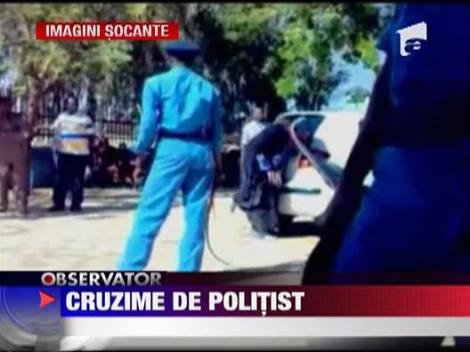 Cruzime de politist! Femeie biciuita public