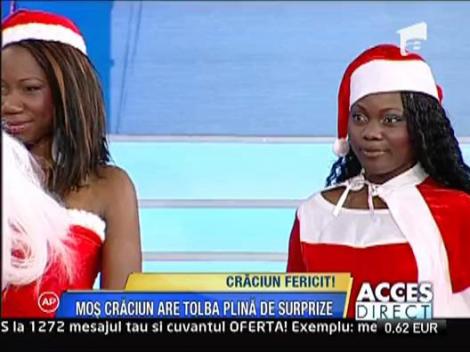 Mos Craciun, insotit de asistente exotice