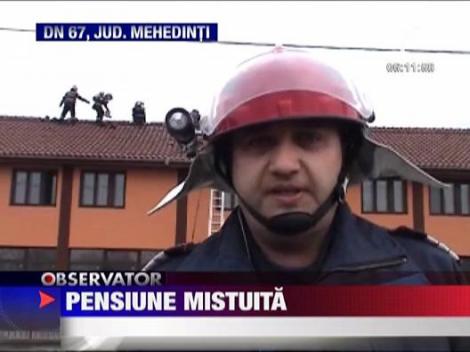 Pensiune mistuita de flacari