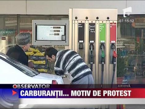 Soferii continua "protestul cu monede" la benzinarii