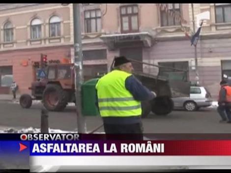 Asfaltarea la romani se face cu lopata si bocancul