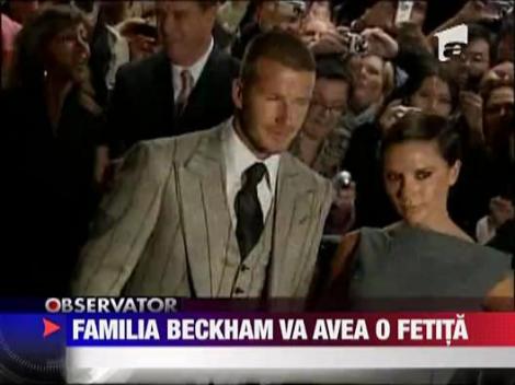 Familia Beckham asteapta o fetita
