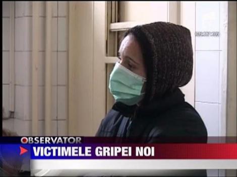 Gripa noua face noi victime