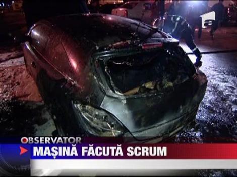 Masina incendiata in Bucuresti
