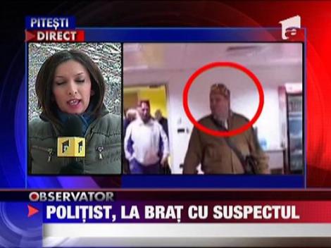 Politist, la brat cu suspectul