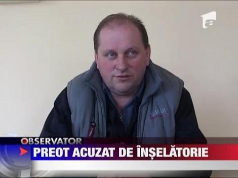 Preot acuzat de inselatorie