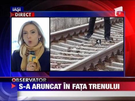 S-a aruncat in fata trenului