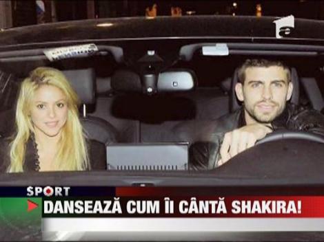 Pique si Shakira s-au sarutat in vazul lumii