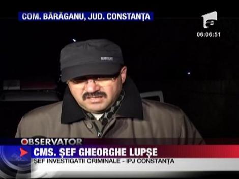 Bebelus ingropat in spatele casei