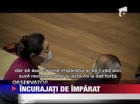 Imparatul Japoniei a vizitat un adapost al sinistratilor