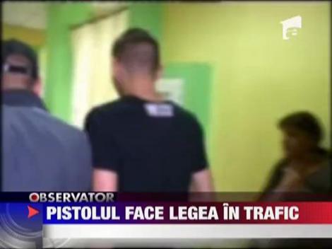 Pistolul face legea in trafic la Craiova