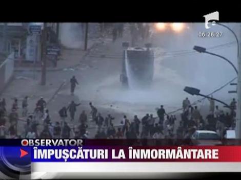 Sirieni impuscati la inmormantare