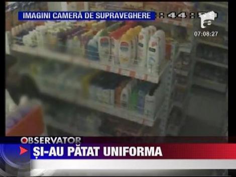 Politisti, hoti din supermarket