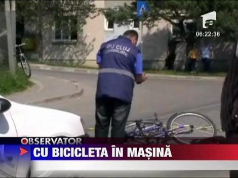Cu bicicleta in masina