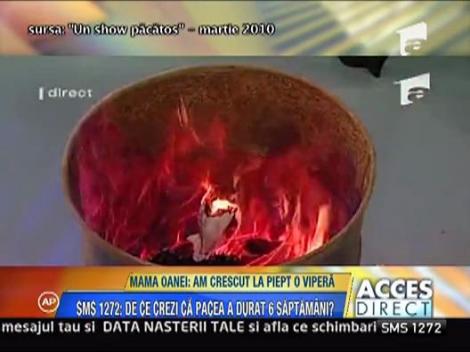 Vezi cum dadea foc Oana hainelor si hartiilor de la mama sa