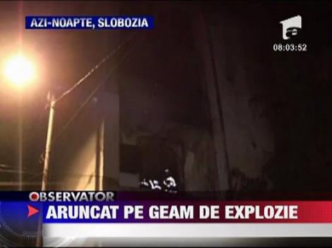 Aruncat pe geam de explozie