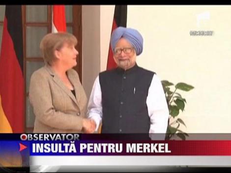 Merkel, insultata de iranieni