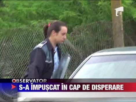 Un politist s-a impuscat in cap de disperare