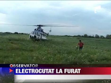 Electrocutat la furat