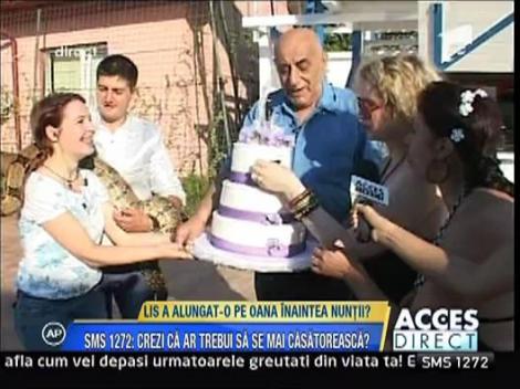 Vezi aici ce tort de nunta are Oana Lis