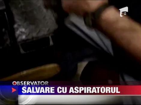 Pisica salvata cu aspiratorul