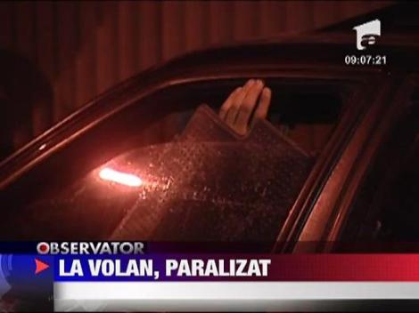 Sofer paralizat, cu masina in trafic