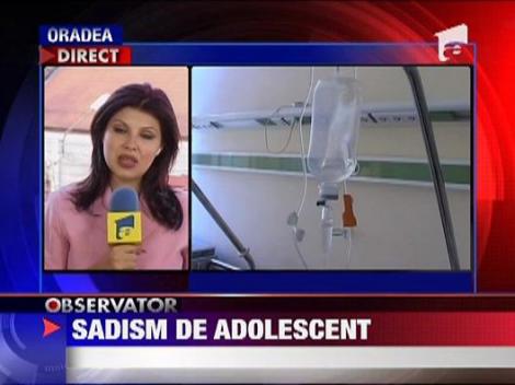 UPDATE / Copii batuti si taiati cu un cutit de catre un vecin