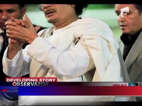 Gaddafi cautat de interpol