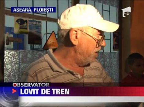 Barbat beat lovit de tren