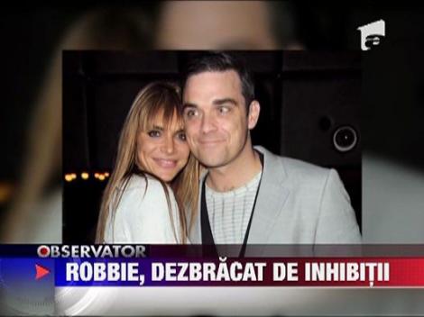 Robbie Williams la X Factor, in costumul lui Adam