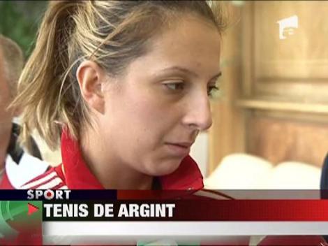Tenis de argint