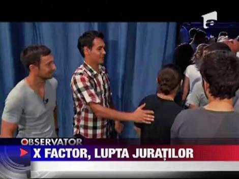 X Factor, lupta juratilor
