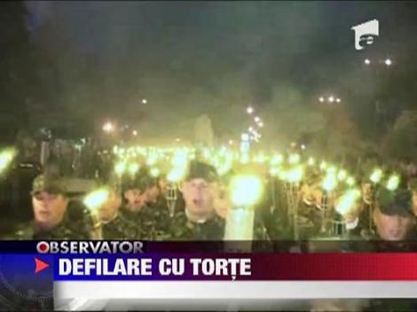 Defilare cu torte in maini