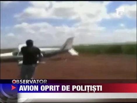 Avion oprit de politisti