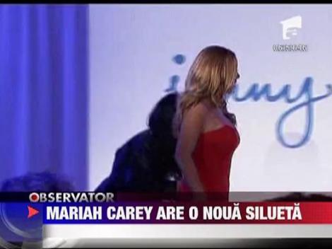 Mariah Carey a slabit  15 kilograme