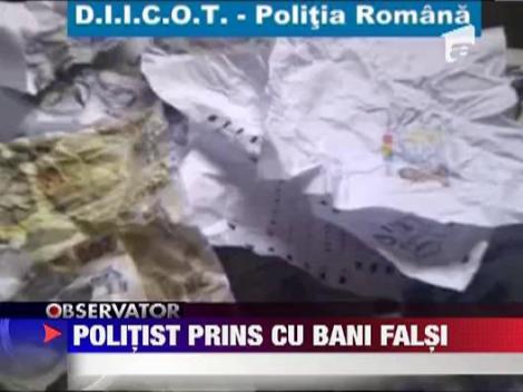 Politist oltean prins la cumparauri cu bani falsi
