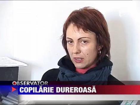 Fetita batuta si tunsa scurt