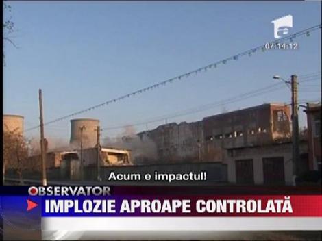 Implozia unui turn a facut praf geamurile din zona