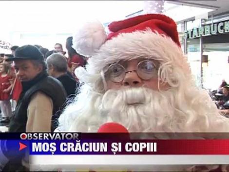 Copiii au cantat pentru Mos Craciun