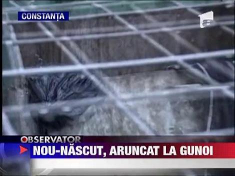 Nou nascut aruncat la gunoi