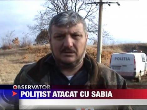 Politist atacat cu sabia