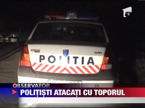 Trei politisti din Mehedinti au fost atacati cu toporul!