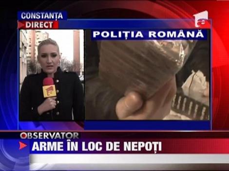 Batrana acuzata de trafic de tigari si de arme