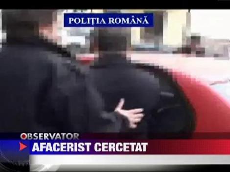 Om de afaceri roman acuzat de jaf armat in Austria