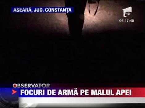 Braconieri pe malul lacului Sinoe