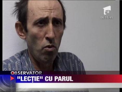 Un elev a fost lovit cu parul de tatal unei colege