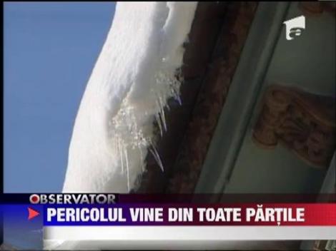 Zeci de amenzi pentru cei care nu au curatat zapada si turturii