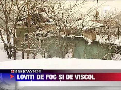 Iarna a lovit in casa unei batrane si cu foc si cu viscol
