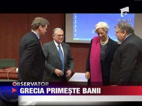 Grecia primeste imprumutul de 130 de miliarde de euro