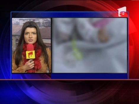 Si-a snopit in bataie bebelusul pentru ca plangea